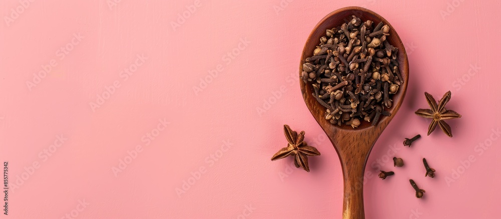 Aufkleber clove on spoon pastel background food isolated herb. with copy space image. place for adding text or