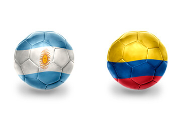 Obraz premium football balls with national flags of colombia and argentina ,soccer teams. on the white background.