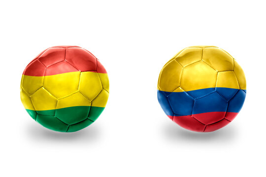 football balls with national flags of colombia and bolivia ,soccer teams. on the white background.
