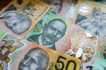 50 and 100 Australian or Aussie currency. AUD pattern as financial background