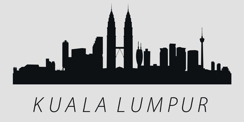 Fototapeta premium The city skyline. Kuala Lumpur. Silhouettes of buildings. Vector on a gray background