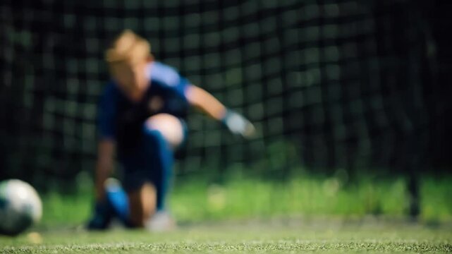Close-up of a Football Player Taking a Penalty Shot