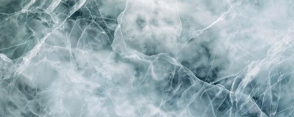 Closeup of an ice surface with intricate patterns and textures. Light blue background backdrop