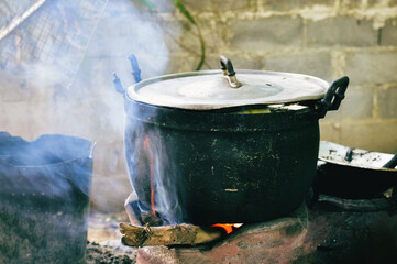 Water boiler, wood stove, firewood and smoke