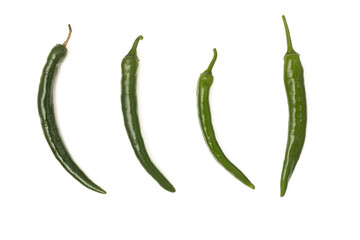 Green hot chili peppers on a white background
