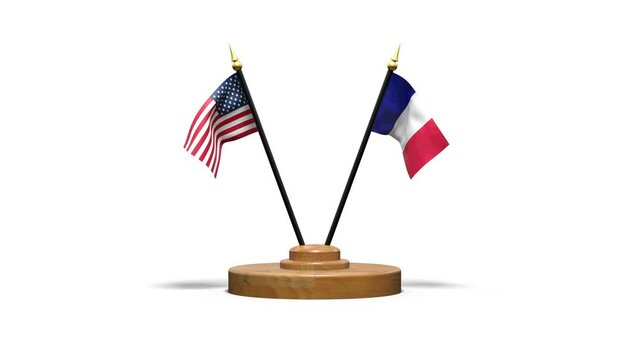 French and American flags on a small wooden base on the occasion of a meeting between the two countries - 3D rendering
