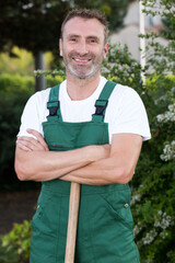 portrait of male gardener with a shovel