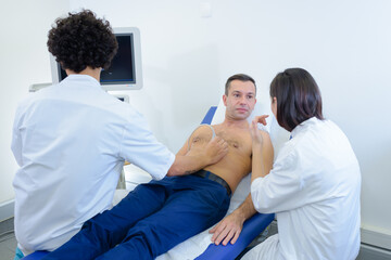 Fototapeta premium man is laying in bed for blood donation