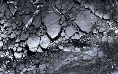 Texture of ice with cracks seen from space.  Elements of this satellite image furnished by Copernicus.
