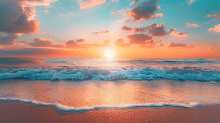 Obraz premium The setting sun casts a golden glow on the ocean waves.