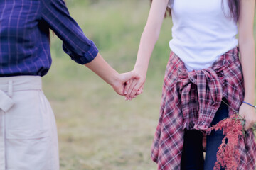 lgbtq couples hold hands to express their love and show couples confidence in their love for each other on their big day and forever. Ideas for showing love and care for lgbtq couples by holding hands