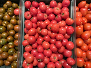 Fresh tomatoes in tray in the market