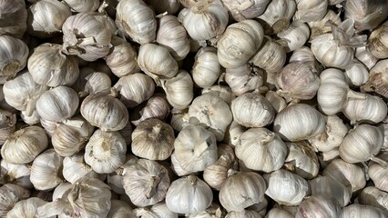 full frame of garlic on market. Garlic background