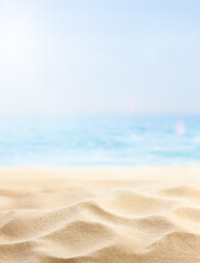 Naklejka na ściany i meble vertical summer background of beach sand and sea