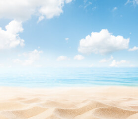 sea ​​and cloudy sky with beach sand in the foreground