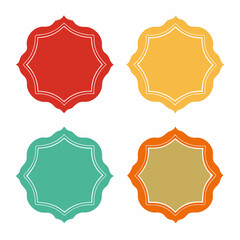 Four colorful circles with white border on white background