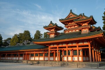 Traditional Japanese Heian-jingu Shrine with intricate wooden architecture and green rooftops