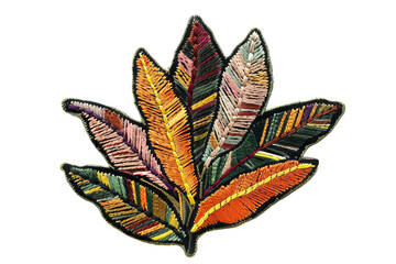 Colorful embroidered fabric leaf design with intricate patterns, perfect for crafts, fashion, or home decor projects.