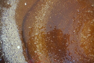 Honey drops, Honey texture with bubbles. Honey processing