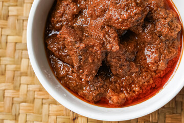 Rendang Daging, a Malaysian traditional dish featuring tender meat cooked in coconut milk and a blend of aromatic spices.