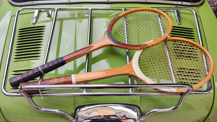 Vintage Tennis Rackets on Classic Car Bonnet Retro Sports Gear Display