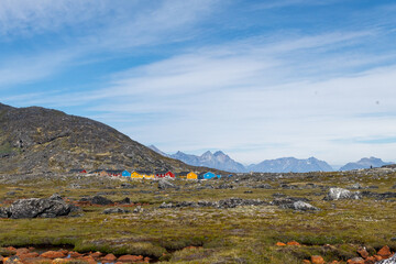 Greenland Nanortalik town landscape with traditional colourful houses on a sunny day