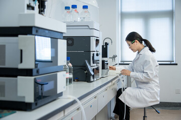 doctor working on computer in lab