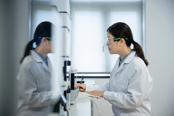 doctor working on computer in lab