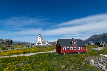 Greenland Nanortalik town landscape with traditional colourful houses on a sunny day