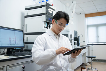 doctor working with tablet in lab