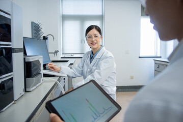 doctor working with tablet in lab