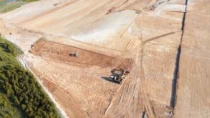 Earthmoving equipment working on large site