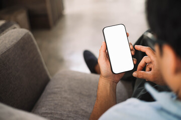 cell phone blank white screen mockup.hand holding texting using mobile on desk at office.background empty space for advertise.work people contact marketing business,technology