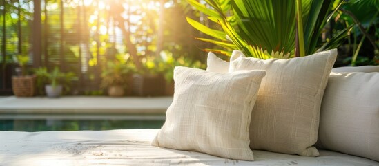Comfortable pillow on sofa decoration outdoor patio with tropical and nature view. Copy space image. Place for adding text and design