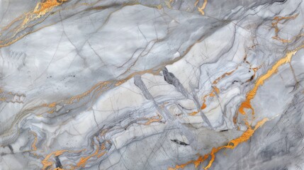 Fototapeta premium The image is of marble with gray and gold. It could be used for countertops, tiles, or other decorative purposes.