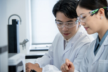 doctor coworking on computer in lab