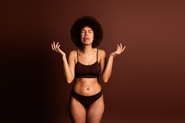 Photo of stressed depressed lady underwear lingery crying feeling diffidence isolated brown color...