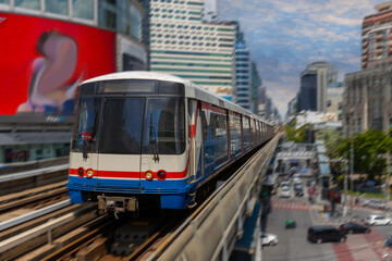 BKK BTS Bangkok Mass Transit System Sky train which is an elevated tram over the busy streets oh BKK Thailand 