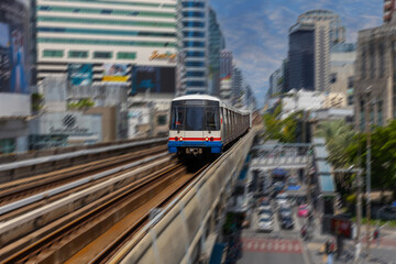 Naklejka premium BKK BTS Bangkok Mass Transit System Sky train which is an elevated tram over the busy streets oh BKK Thailand 