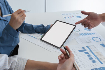Team of Accountants Collaborating on Financial Calculations and Data Analysis in a Modern Office Setting