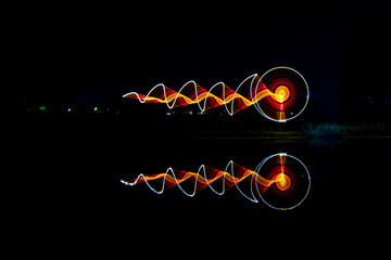 The art of a light painting at night.