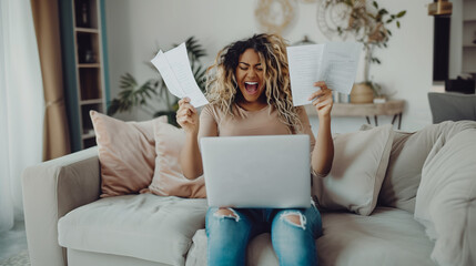 A woman received joyful news related to something she was writing, calculating, or editing. She raises her hands with papers with a wide smile. Editor, student, accountant, writer, or journalist.