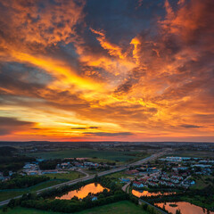 Amazing sunset over the road in Straszyn town. Poland
