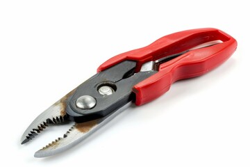Obraz premium Rusty Pliers with Red Handle on White Background
