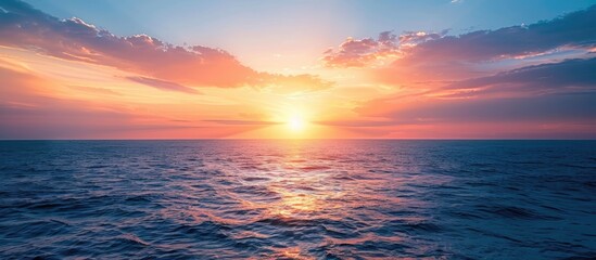 Fototapeta premium sunset at sea. variety of colors and hues of the rising sun. Sea landscape. Copy space image. Place for adding text or design