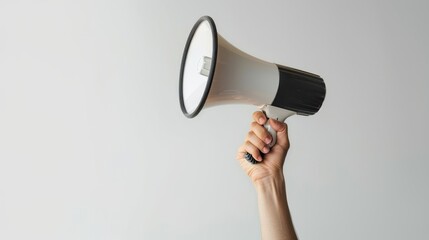 Hand Holding a Loudspeaker