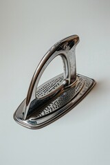 Close-up view of an iron and its surroundings on a table