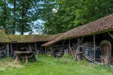 old farm shed with junk