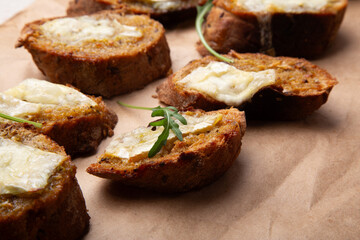 Gourmet toast medley with melting brie cheese and aromatic herbs