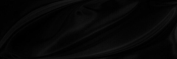 Black gray satin dark fabric texture luxurious shiny that is abstract silk cloth panorama background with patterns soft waves blur beautiful.